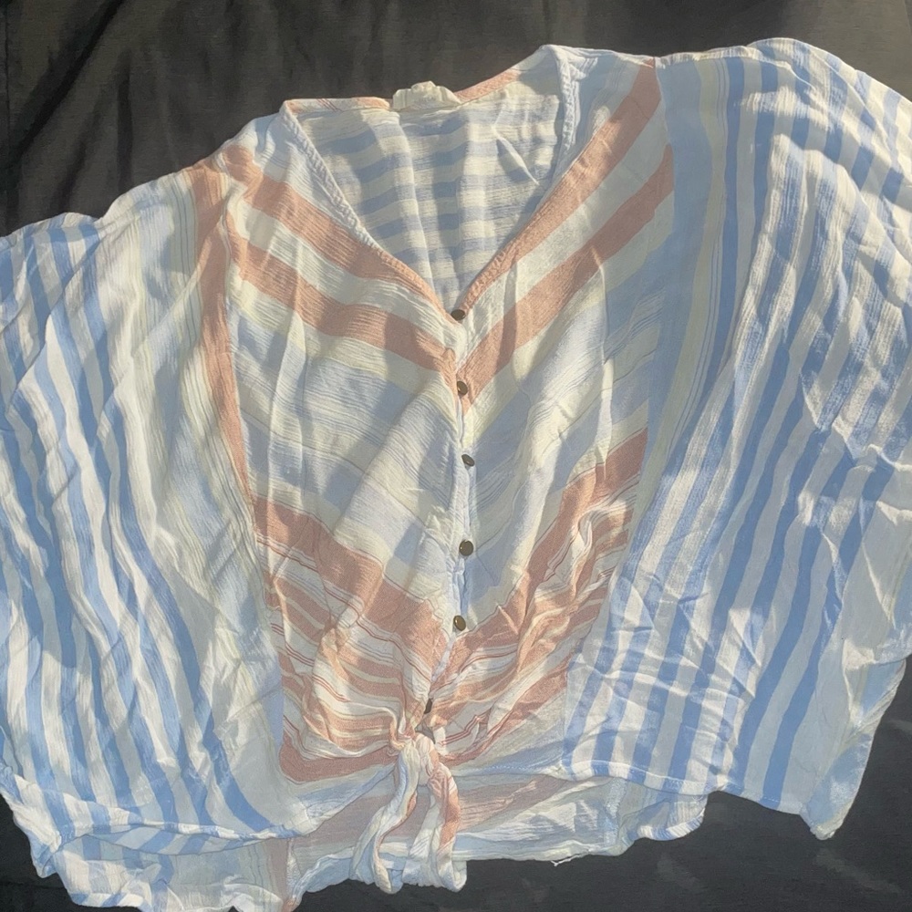 Women’s size large cropped blouse.
